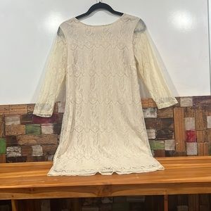 NWT low back crème lace dress.